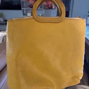 Clare V yellow backpack purse